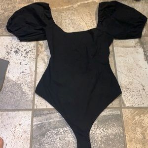 Black puff sleeve body suit with ties in back